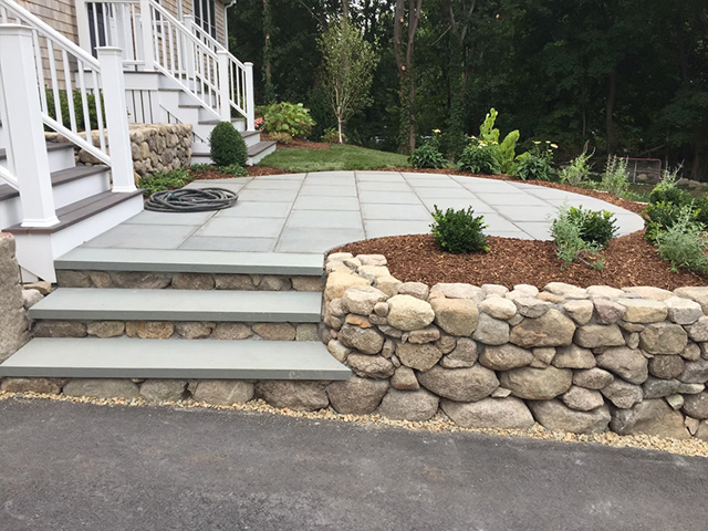 Stone patio with steps