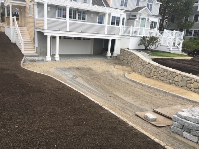 Driveway with stone siding